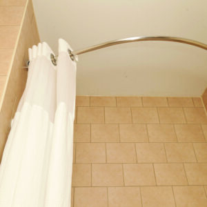 bathroom-safety-aid-curved-shower-rod-curtain